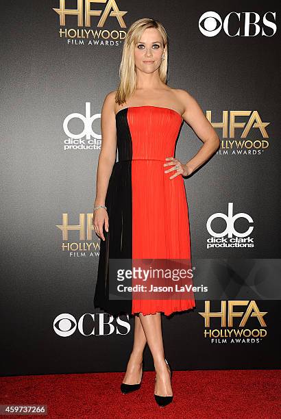 Actress Reese Witherspoon poses in the press room at the 18th annual Hollywood Film Awards at Hollywood Palladium on November 14, 2014 in Hollywood,...