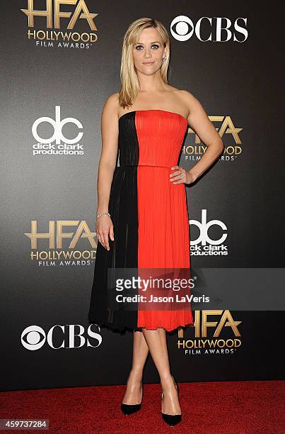 Actress Reese Witherspoon poses in the press room at the 18th annual Hollywood Film Awards at Hollywood Palladium on November 14, 2014 in Hollywood,...