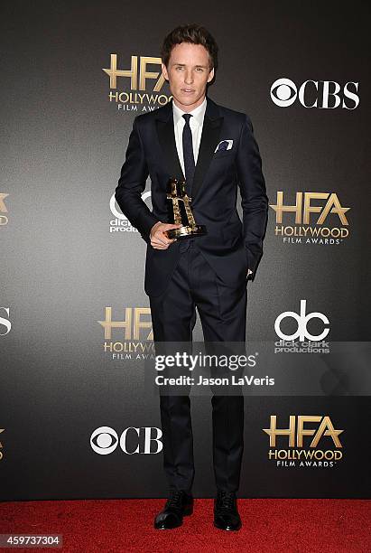 Actor Eddie Redmayne poses in the press room at the 18th annual Hollywood Film Awards at Hollywood Palladium on November 14, 2014 in Hollywood,...