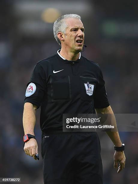 Referee Chris Foy in action during the Barclays Premier League match between West bromwich Albion and Arsenal at The Hawthorns on November 29, 2014...