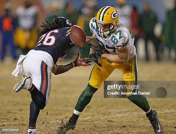 Tim Jennings of the Chicago Bears breaks up a pass intended for Jordy Nelson of the Green Bay Packers at Soldier Field on December 29, 2013 in...