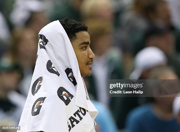 Gary Harris of the Michigan State Spartans watches the action during the second half of the game against the New Orleans Privateers at the Breslin...