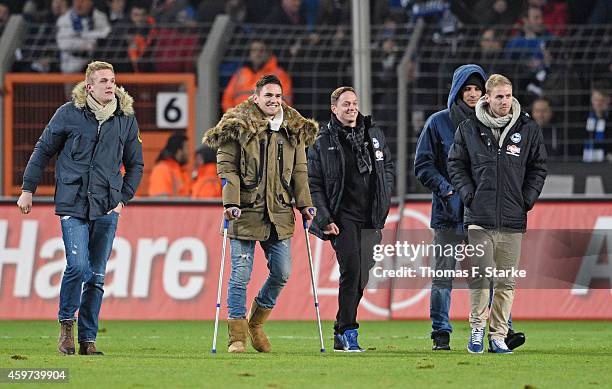 Jarno Peters, Pascal Testroet, Christian Mueller, Jerome Propheter and Felix Burmeister of Bielefeld corss the pitch after the Third League match...
