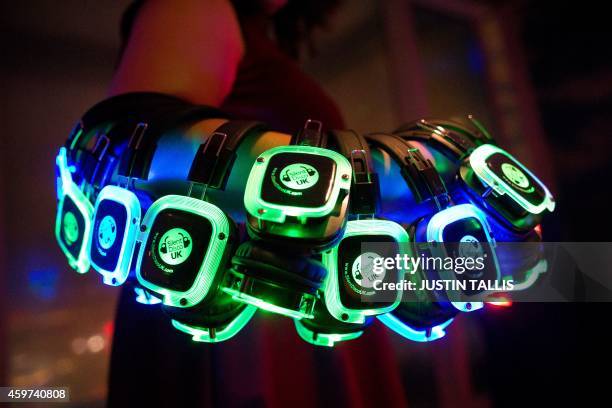 Headphones are seen at a 'Silent Disco' in the "Shard" tower on the south bank of the river Thames in central London on November 15, 2014. London's...