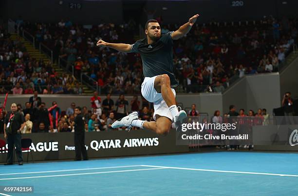 Jo-Wilfried Tsonga of the Manila Mavericks celebrates after victory in his doubles match with Treat Huey against Tomas Berdych and Nick Kyrgios of...