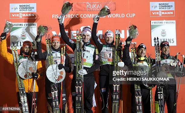 Second placed Germany's Eric Frenzel and Bjoern Kircheisen, winner Norway's Joergen Graabak and Haavard Klemetsen and third placed France's Francois...