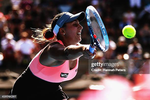 Tamira Paszek of Austria plays a forehand against Jamie Hampton of the USA during day one of the ASB Classic at ASB Tennis Centre on December 30,...