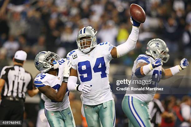 DeMarcus Ware and Morris Claiborne of the Dallas Cowboys celebrate a fumble recovery in the second half against the Philadelphia Eagles at Cowboys...