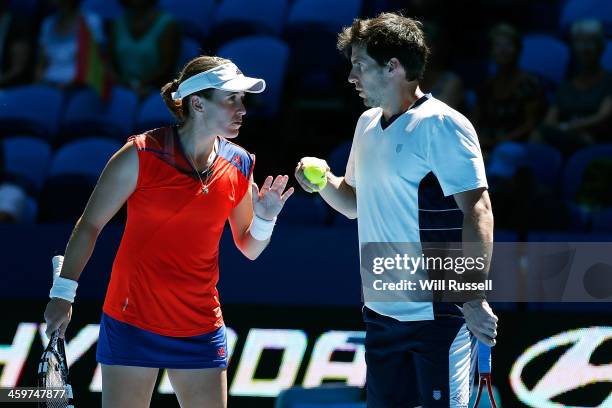 Daniel Munoz-De La Nava and Anabel Medina Garrigues of Spain talk inbetween play in the mixed doubles match against Sloane Stephens and John Isner of...