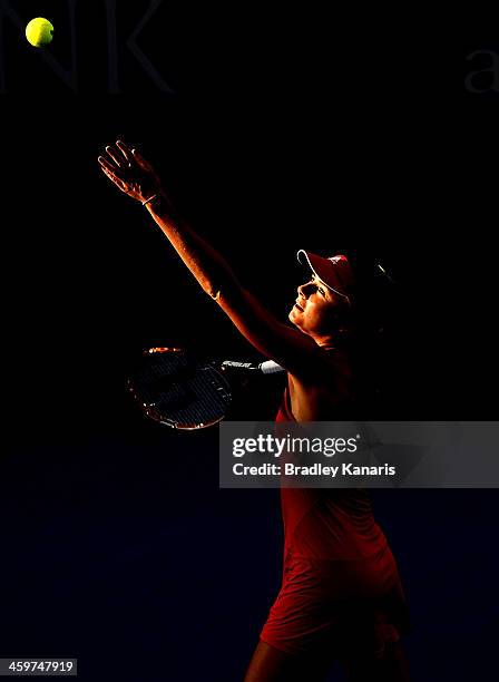 Daniela Hantuchova of Sovlakia serves against Ashleigh Barty of Australia during day two of the 2014 Brisbane International at Queensland Tennis...