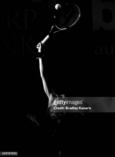 Daniela Hantuchova of Sovlakia serves against Ashleigh Barty of Australia during day two of the 2014 Brisbane International at Queensland Tennis...