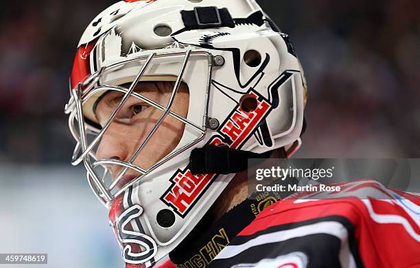 Youri Ziffzer, goaltender of Koeln skates against the Schwenninger Wild Wings puck during the DEL match between Koelner Haie and Schwenninger Wild...