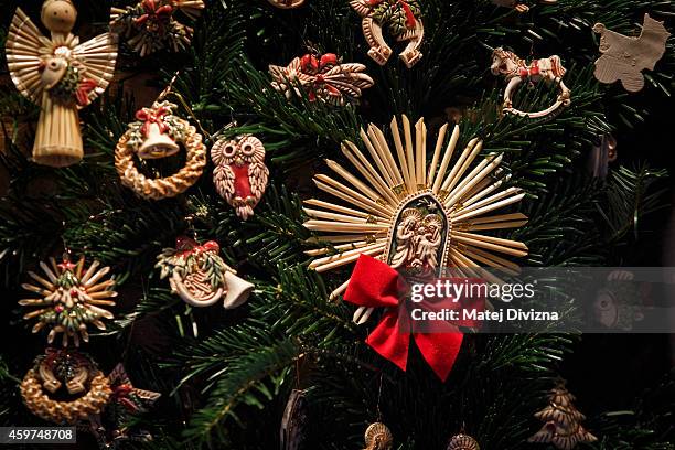 Christmas decorations are display for sale at the Christmas market at the Old Town Square on November 30, 2014 in Prague, Czech Republic. Christmas...