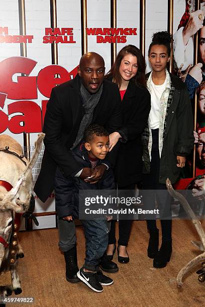 Emma Gyasi and David Gyasi attend the UK Premiere of "Get Santa" at Vue West End on November 30, 2014 in London, England.