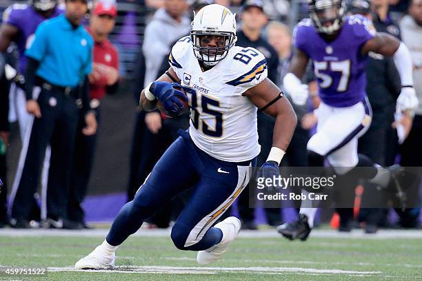 Tight end Antonio Gates of the San Diego Chargers picks up yards after a second quarter catch during a game against the Baltimore Ravens at M&T Bank...