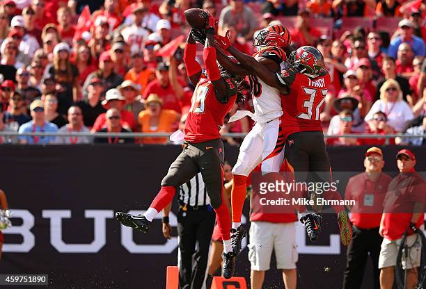 Brandon Dixon of the Tampa Bay Buccaneers catches an interception over A.J. Green of the Cincinnati Bengals during a game at Raymond James Stadium on...