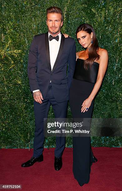 David Beckham and Victoria Beckham attend the 60th London Evening Standard Theatre Awards at London Palladium on November 30, 2014 in London, England.