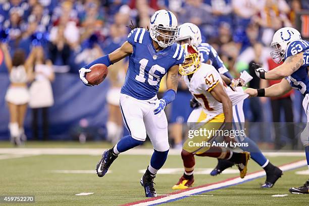 Josh Cribbs of the Indianapolis Colts runs with the ball during the game against the Washington Redskins at Lucas Oil Stadium on November 30, 2014 in...