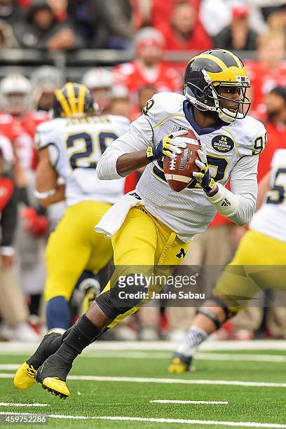 Quarterback Devin Gardner of the Michigan Wolverines runs with the ball against the Ohio State Buckeyes at Ohio Stadium on November 29, 2014 in...