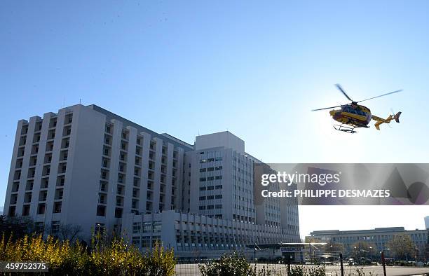 Helicopter of the civil security takes off on December 30, 2013 at the Grenoble University Hospital Centre, French Alps, where Michael Schumacher,...