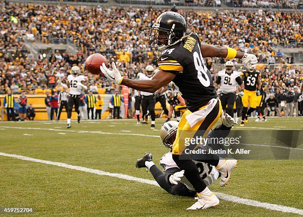 Antonio Brown of the Pittsburgh Steelers can't make a catch in front of Patrick Robinson of the New Orleans Saints during the second quarter at Heinz...