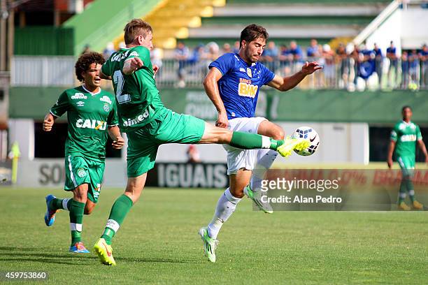 Fabiano of Chapecoense struggles for the ball with a Lucas Silva of Cruzeiro during a match between Chapecoense and Cruzeiro for the Brazilian Series...