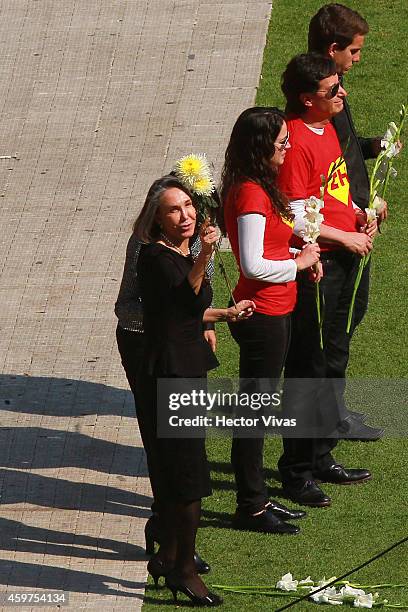 Florinda Meza, widow of the late Mexican comedian, screenwriter, TV producer, actor and director Roberto Gomez Bolanos carries flowers during his...