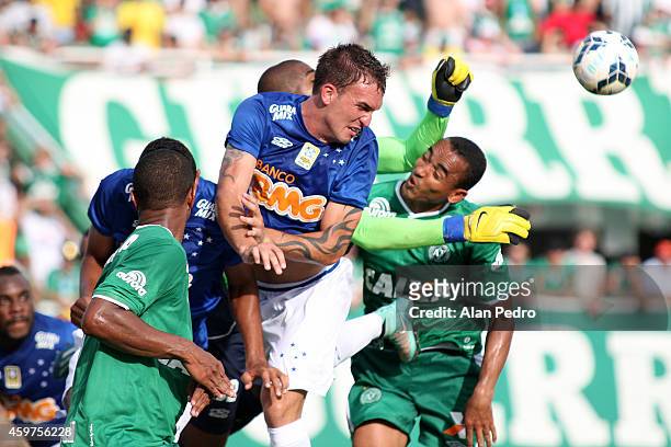 Willian Farias of the Cruzeiro and Diones of Chapecoense compete for a header during the between Chapecoense and Cruzeiro for the Brazilian Series A...