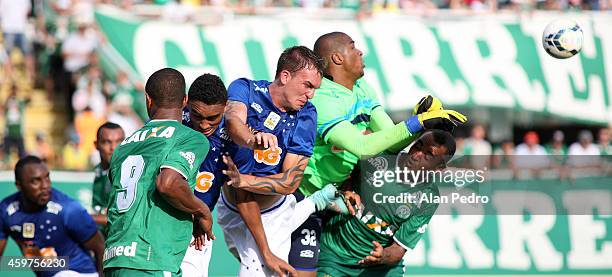 Willian Farias of the Cruzeiro and Diones of Chapecoense compete for a header during the between Chapecoense and Cruzeiro for the Brazilian Series A...