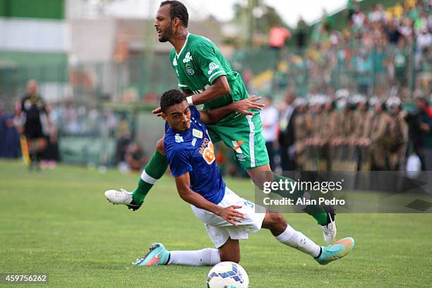 Eurico of Cruzeiro struggles for the ball with a Bruno Silva of Chapecoense during a match between Chapecoense and Cruzeiro for the Brazilian Series...