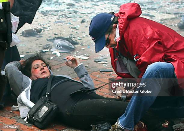 Kevin Corcoran of Lowell used his belt as a tourniquet on the leg of his wife, Celeste, at the scene of the first explosion on Boylston Street near...