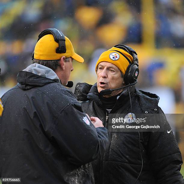 Defensive coordinator Dick LeBeau of the Pittsburgh Steelers talks to linebackers coach Keith Butler during a game against the Cleveland Browns at...