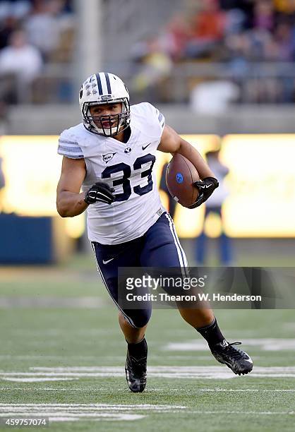 Paul Lasike of the Brigham Young Cougars carries the ball against the California Golden Bears at California Memorial Stadium on November 29, 2014 in...