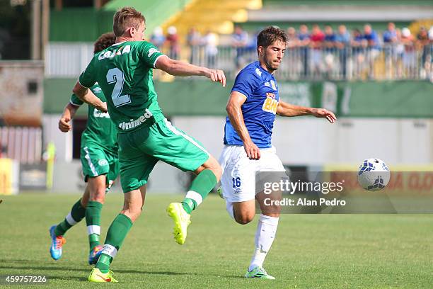 Neilton of Cruzeiro plays for the ball with a Fabiano of Chapecoense during a match between Chapecoense and Cruzeiro for the Brazilian Series A 2014...