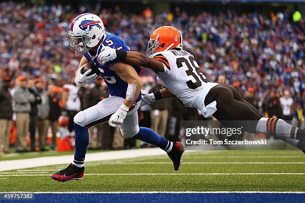 Chris Hogan of the Buffalo Bills scores a touchdown as K'Waun Williams of the Cleveland Browns defends during the second half at Ralph Wilson Stadium...