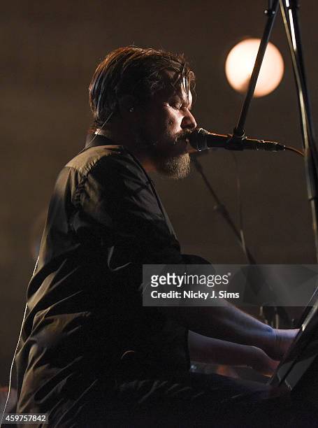 John Grant performs with the Royal Northern Sinfonia on stage at the Royal Festival Hall on November 30, 2014 in London, England.