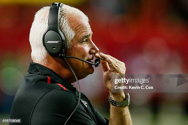Head coach Mike Smith of the Atlanta Falcons reacts to a play during the first half against the Arizona Cardinals at the Georgia Dome on November 30,...