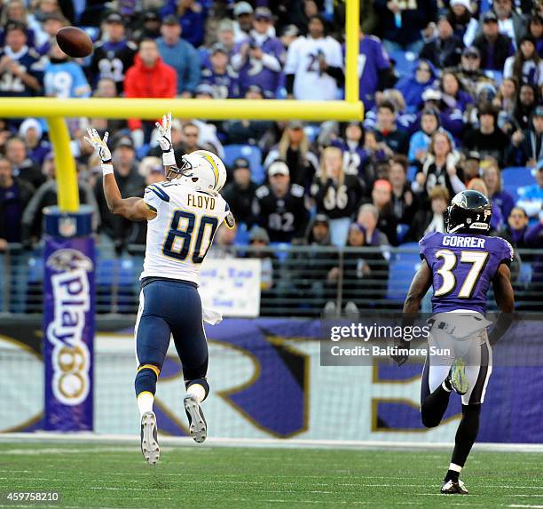 San Diego Chargers wide receiver Malcom Floyd, left, beats Baltimore Ravens cornerback Danny Gorrer, right, for a 59-yard catch during the third...