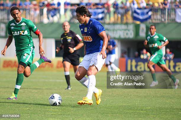 Marcelo Moreno of Cruzeiro struggles for the ball with a Rafael Lima of Chapecoense during a match between Chapecoense and Cruzeiro for the Brazilian...