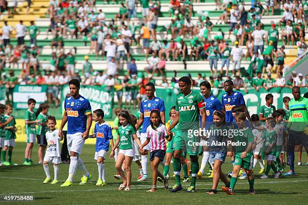 Players of Cruzeiro and Chapecoense enter into the field before a match between Chapecoense and Cruzeiro for the Brazilian Series A 2014 at Arena...
