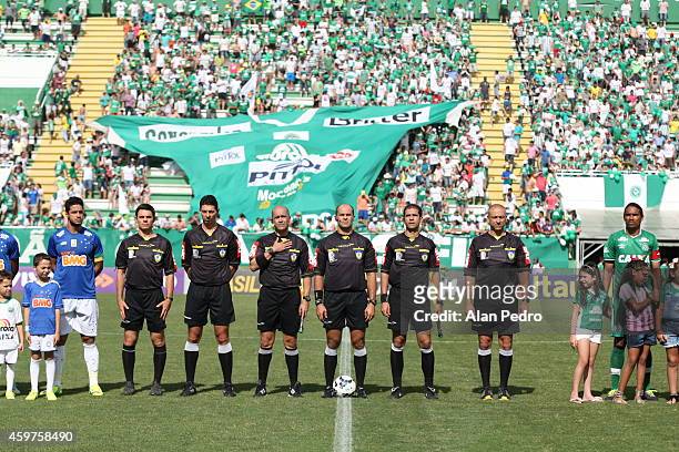Referees enter into the field before a match between Chapecoense and Cruzeiro for the Brazilian Series A 2014 at Arena Conda Stadium on November 30,...