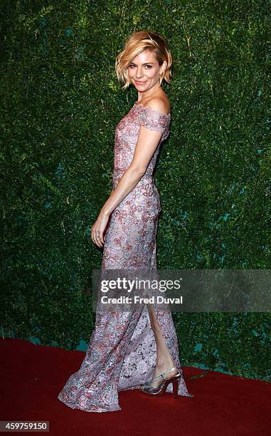 Sienna Miller attends the 60th London Evening Standard Theatre Awards at London Palladium on November 30, 2014 in London, England.