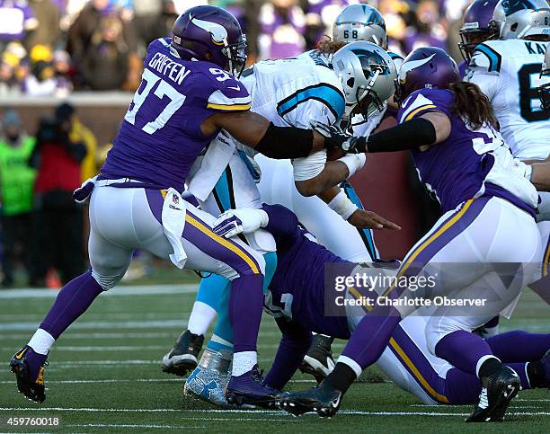 Carolina Panthers quarterback Cam Newton is sacked by Minnesota Vikings defensive end Everson Griffen during fourth quarter action on Sunday, Nov. 30...