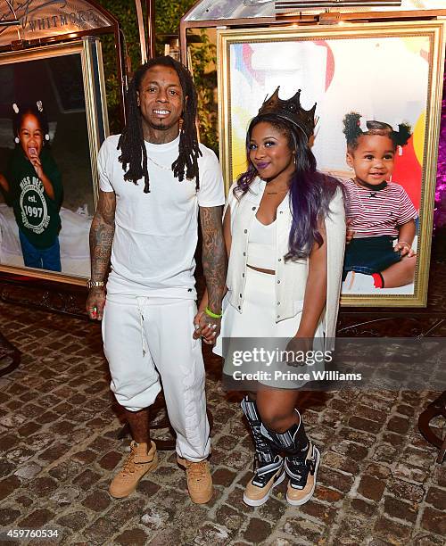 Lil Wayne and Reginae Carter attend Reginea's "All White" Sweet 16 birthday party at Summerour Studio on November 29, 2014 in Atlanta, Georgia.