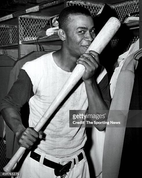 Larry Doby of the Cleveland Indians kisses the bat with which he hit a home run in game four of the 19448 World Series against the Boston Braves on...