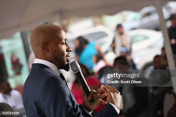 Carlton Lee delivers a sermon at The Flood Christian Church on November 30, 2014 in Ferguson, Missouri. Michael Brown, the Father of Michael Brown...