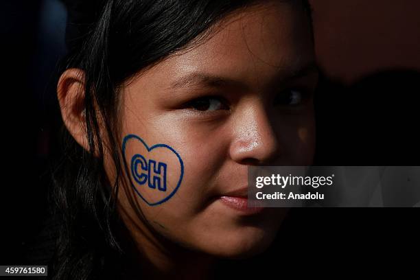 Girl takes part in homage to Mexican comedian, screenwriter, TV producer, actor and director Roberto Gomez Bolanos at Azteca Stadium on November 30,...
