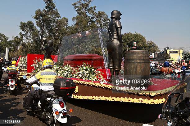 The coffin of Mexican comedian Roberto Gomez Bolanos is seen during an homage at Azteca Stadium on November 30, 2014 in Mexico City, Mexico. Comedy...
