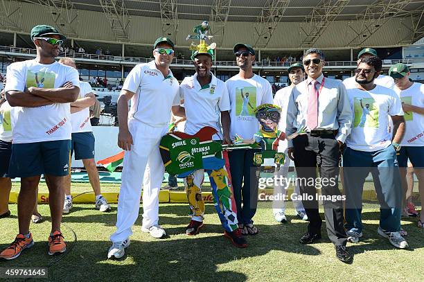 Jacques Kallis with a fan during day 5 of the 2nd Test match between South Africa and India at Sahara Stadium Kingsmead on December 30, 2013 in...