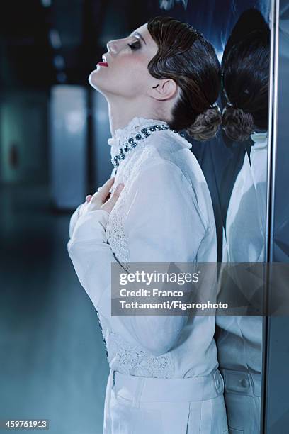 Singer Anna Calvi is photographed for Madame Figaro on September 26, 2013 in Paris, France. Blouse and pants . PUBLISHED IMAGE. CREDIT MUST READ:...